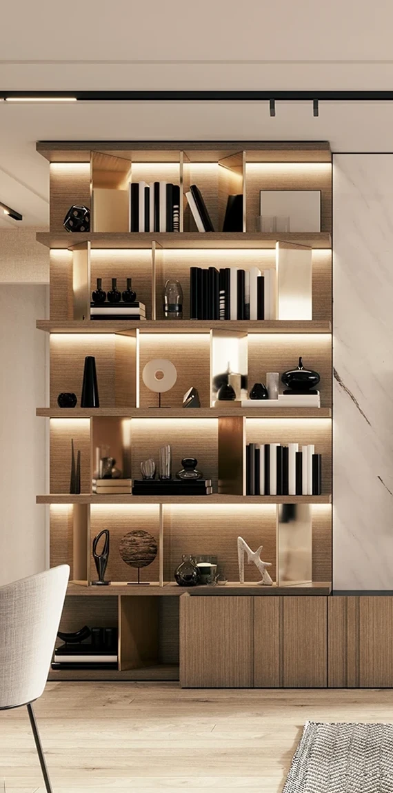 Bibliothèque en bois rétroéclairée garnie d’objets noirs et blancs, univers d’agencement haut de gamme de l’Atelier Orma